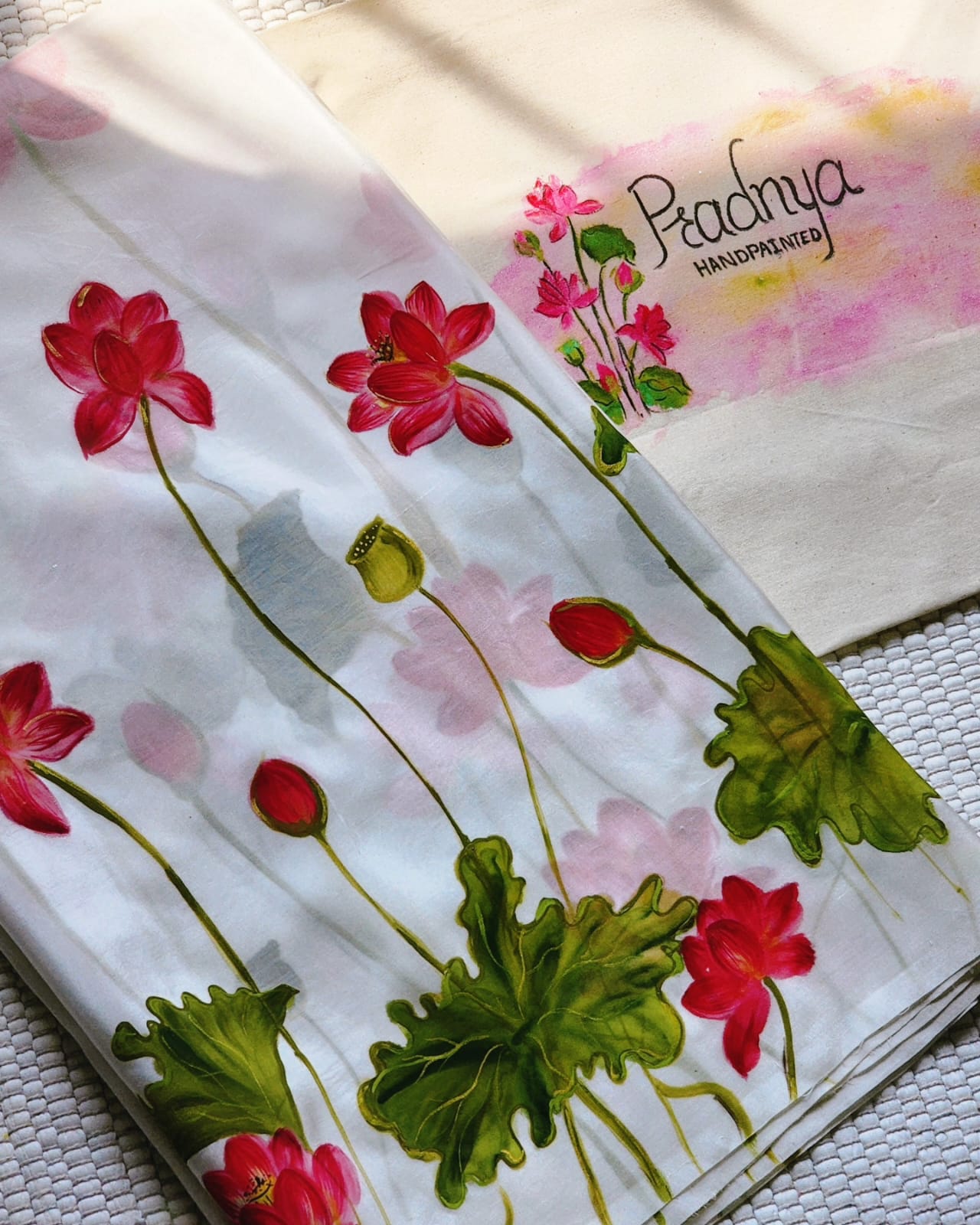 Pradnya Handpainted Lotus Motif Hand-Painted Pure Silk Saree – White & Pink Floral