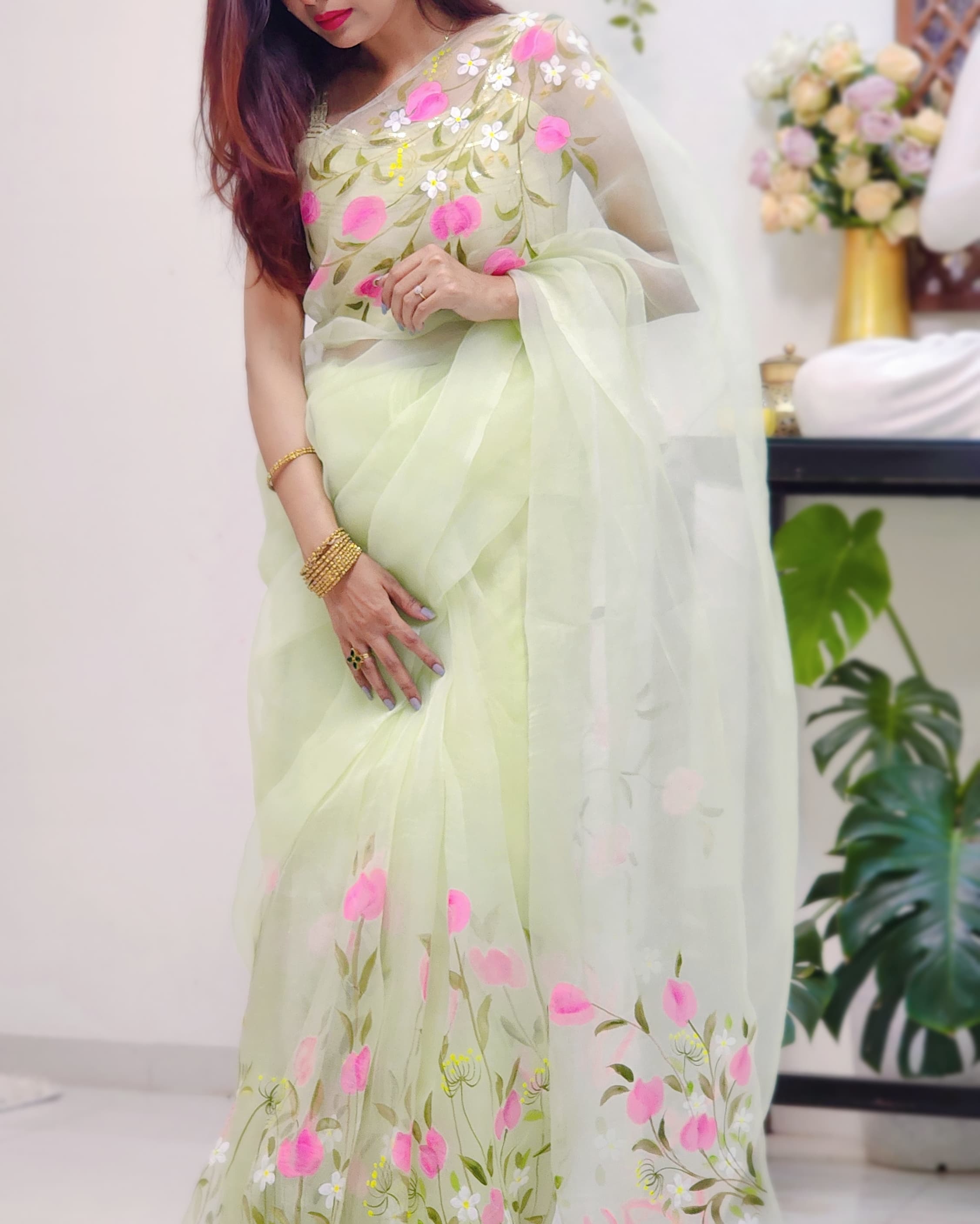 Spring on Organza – Handpainted Pure Organza Silk Saree in Pista Green with Floral Motifs