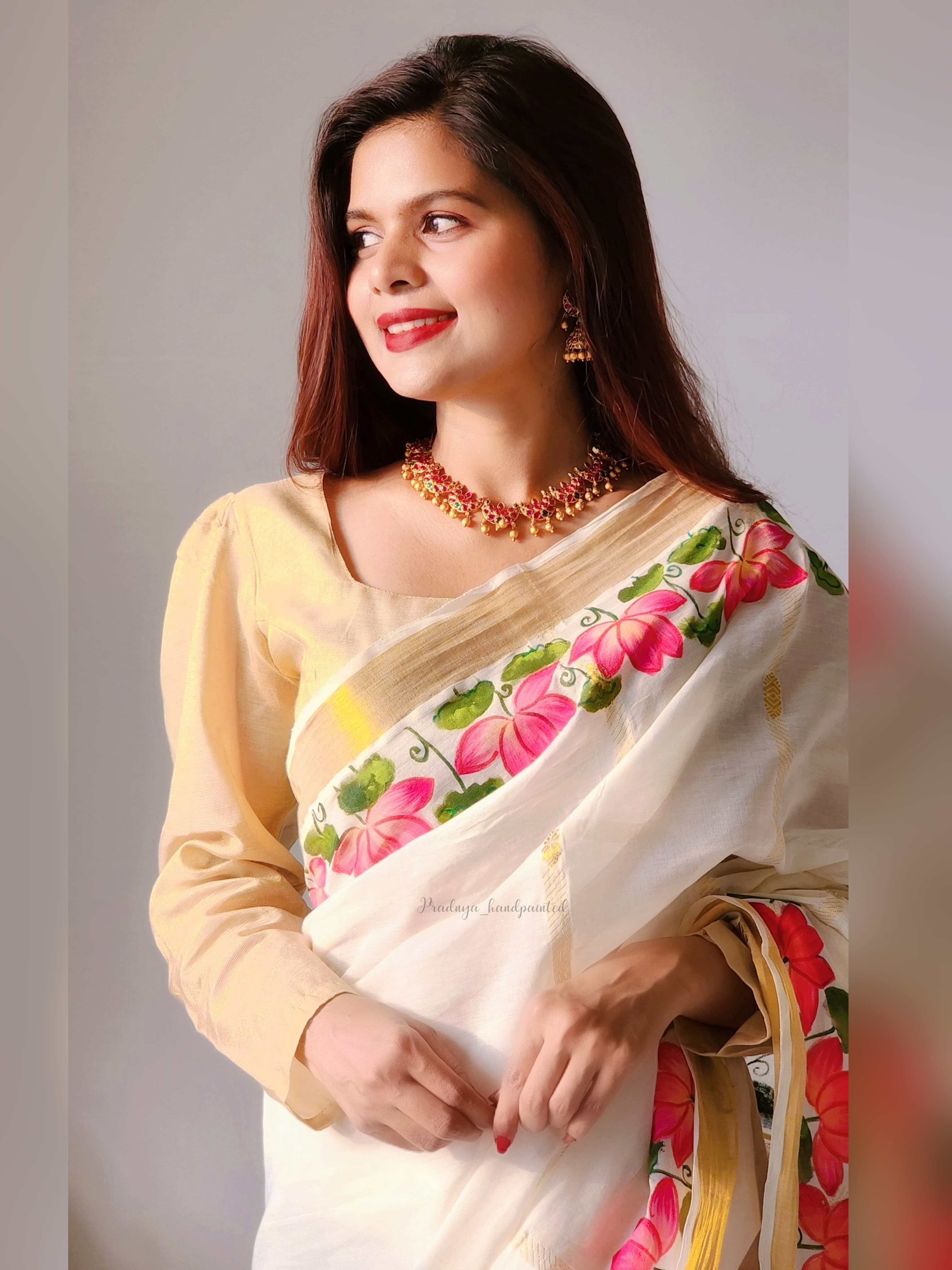 Kerala Kasavu Lotus Hand-Painted Saree – Ivory Floral Border